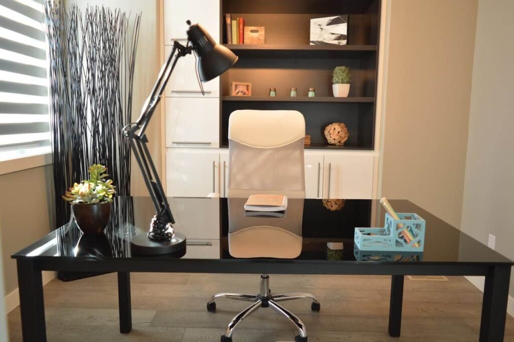 Stylish workspace with laptop and home decor representing trending home finds, luxury lifestyle ideas, and side hustle inspiration from Trend Haven Hub